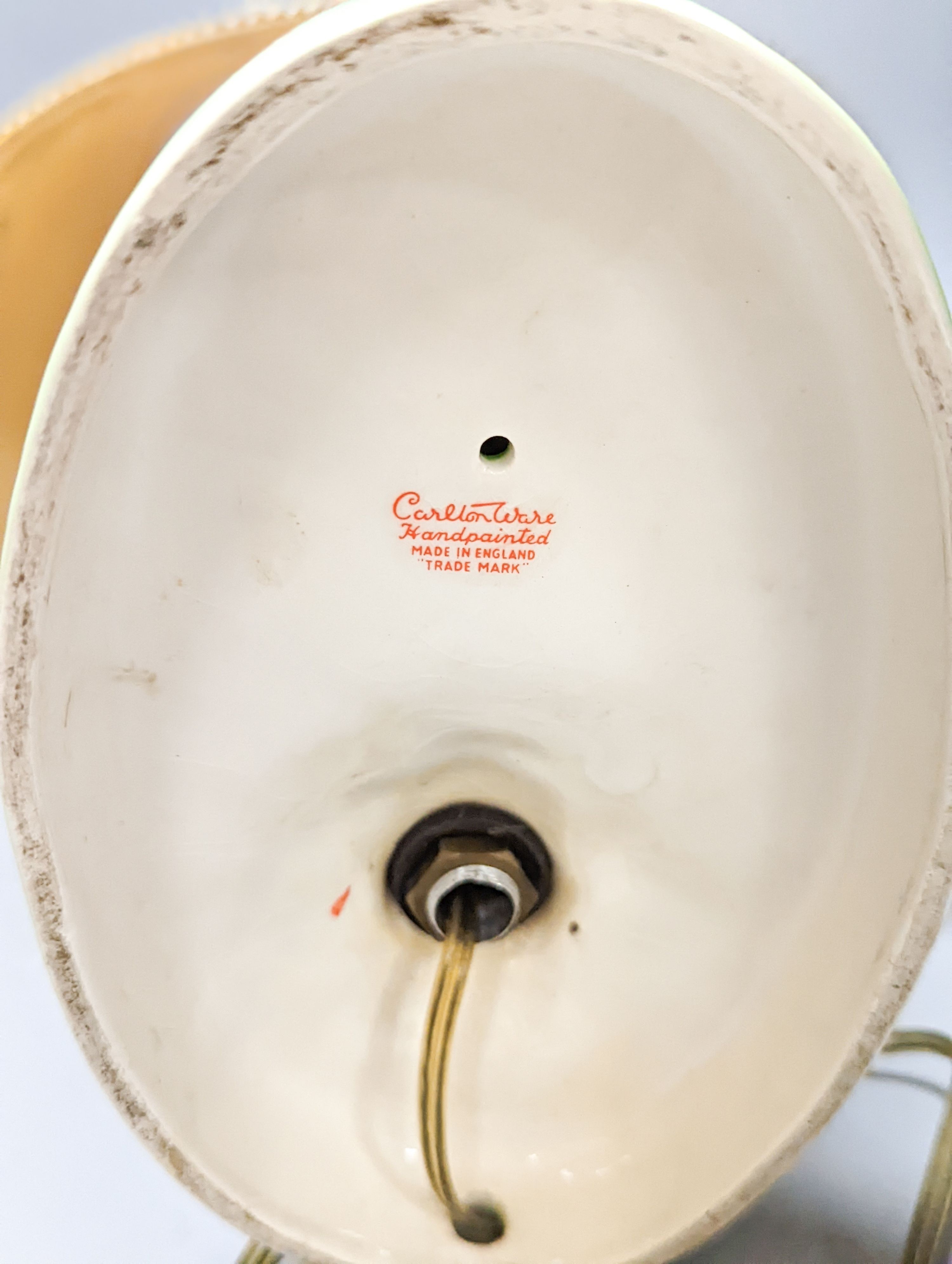 A Guinness toucan lamp, with original shade, tail repaired